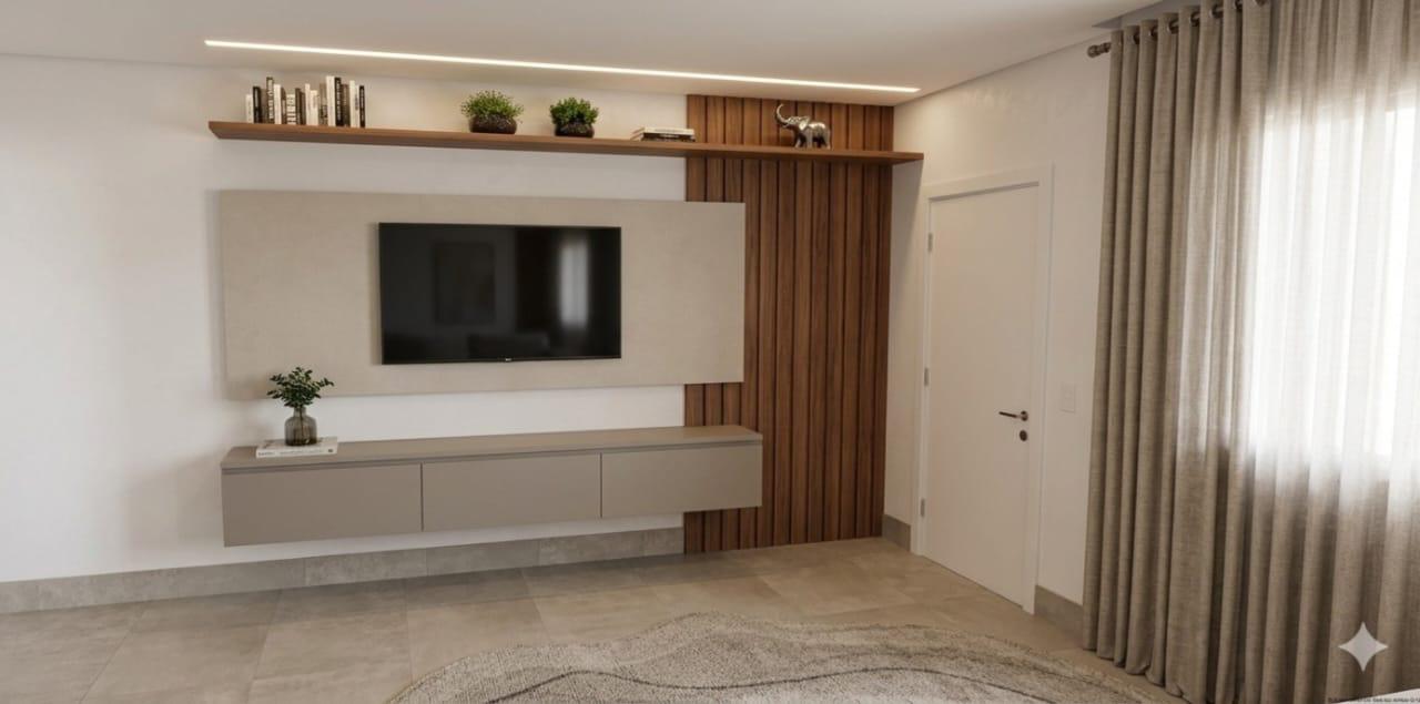 Sala de estar com painel de TV e marcenaria em madeira
